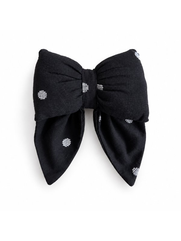 Black Dot bow, top-down on white