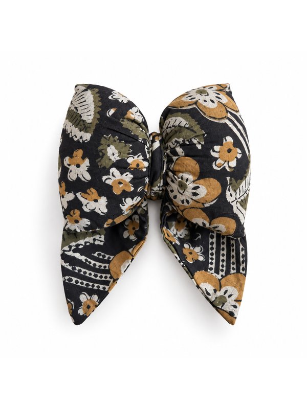 Black Gold Floral bow, top-down on white