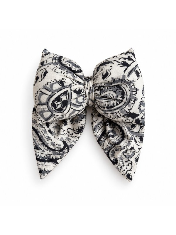 Cream Paisley bow, top-down on white