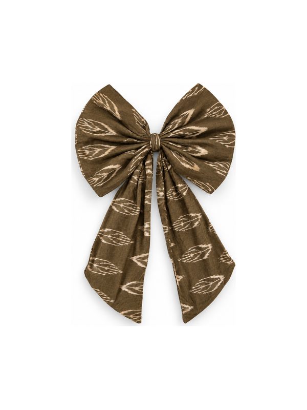 Neela Bow in olive with a leaf print, top-down on white